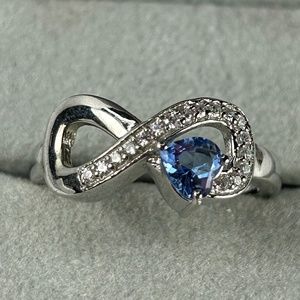 Sterling silver Lab created Ceylon sapphire heart infinity ring